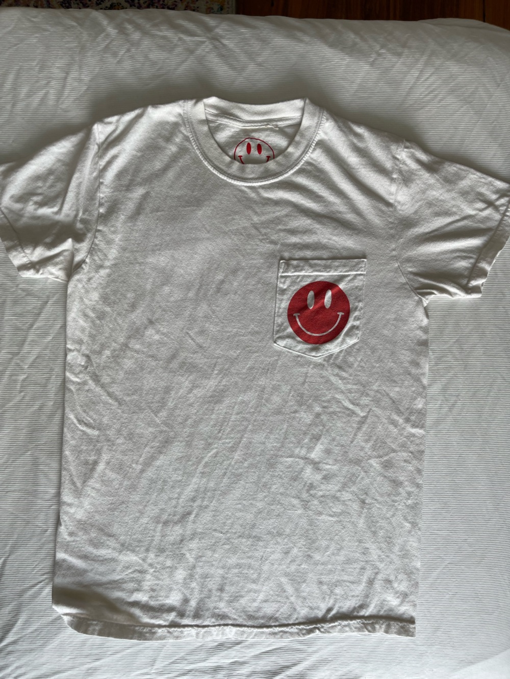 Men's White Short-Sleeve Pocket Tee with Red Smiley Graphic